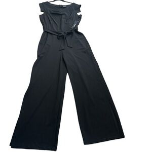 Bebe jumpsuit wide leg slits side black size 14 new